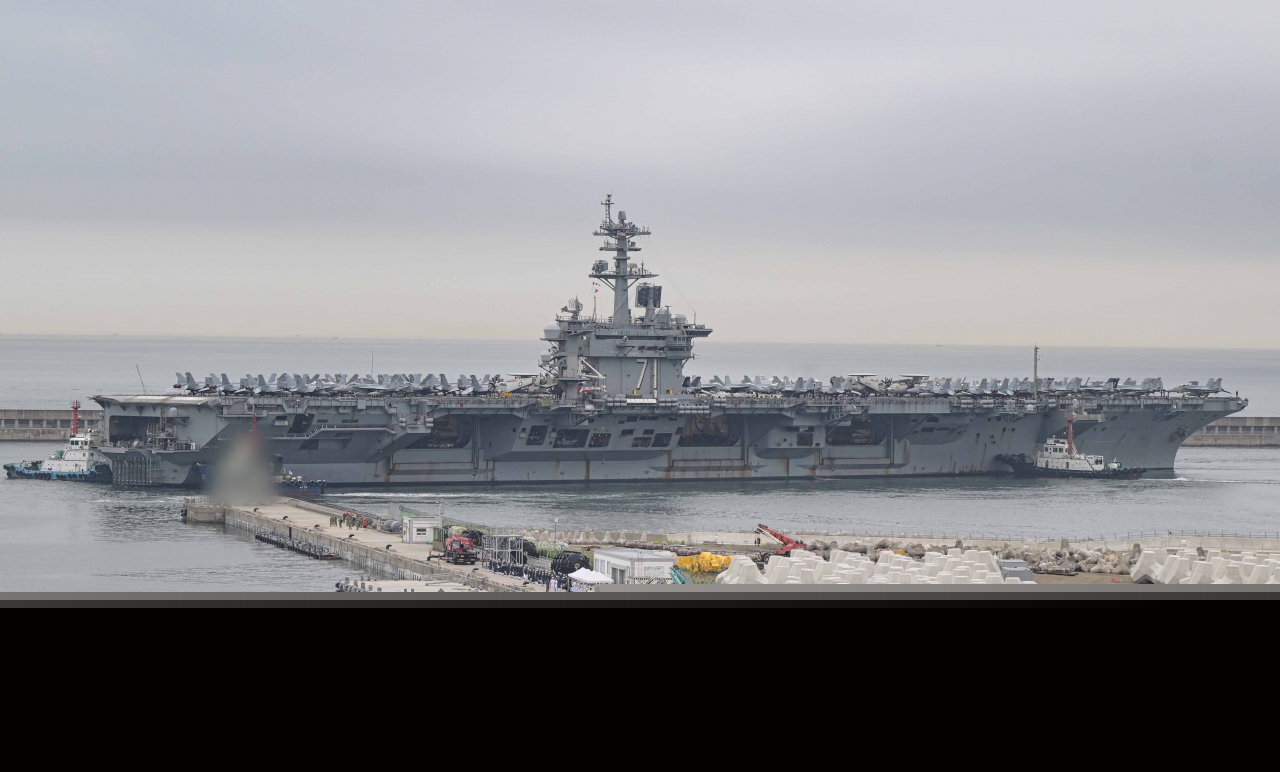 The nuclear-powered aircraft carrier USS Theodore Roosevelt arrives at a naval base in the southeastern port city of Busan, on June 22. (Yonhap)