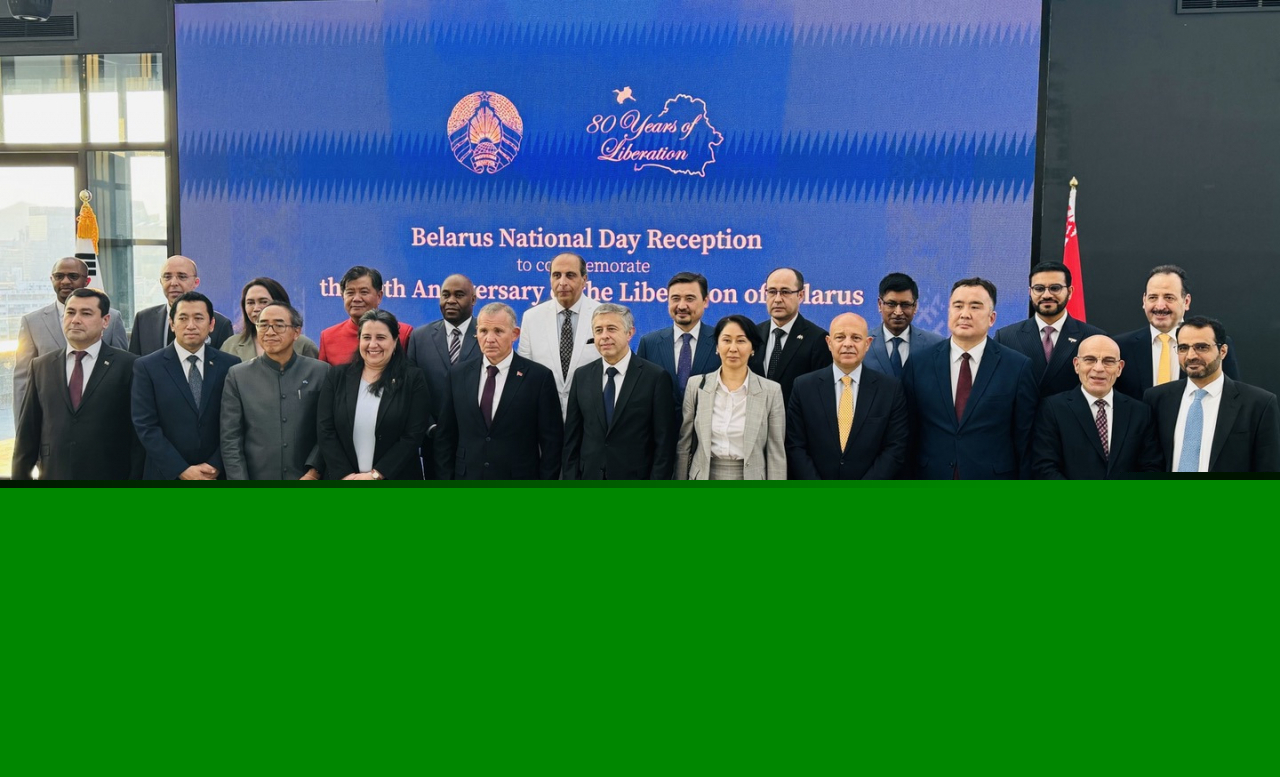 Members of the diplomatic corps pose for a group photo at Belarusian National Day at the Ambassador Hotel in Jung-gu, Seoul on Friday.(Sanjay Kumar/ The Korea Herald)