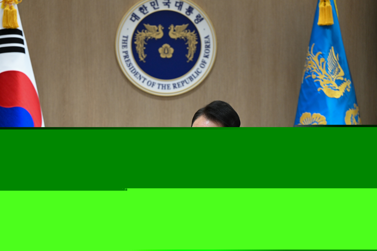 President Yoon Suk Yeol bangs the gavel to open a Cabinet meeting at the presidential office in Seoul on Tuesday. (Yonhap)