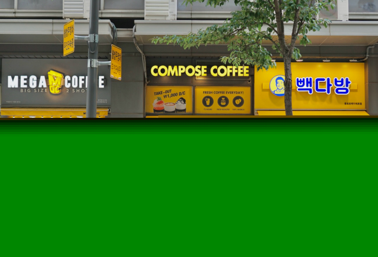 Mega MGC Coffee, Compose Coffee and Paik's Coffee stores stand side by side in Seoul's Jongno-gu. (No Kyung-min/The Korea Herald).