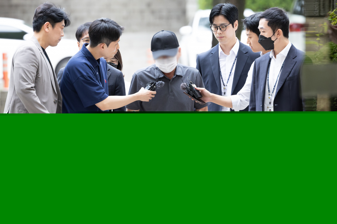 The 68-year-old driver behind the fatal car crash that killed nine pedestrians near Seoul City Hall on July 1 attends an arrest warrant hearing at Seoul Central District Court, Tuesday. (Yonhap)